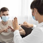 group-deaf-people-communicating-through-sign-language-min